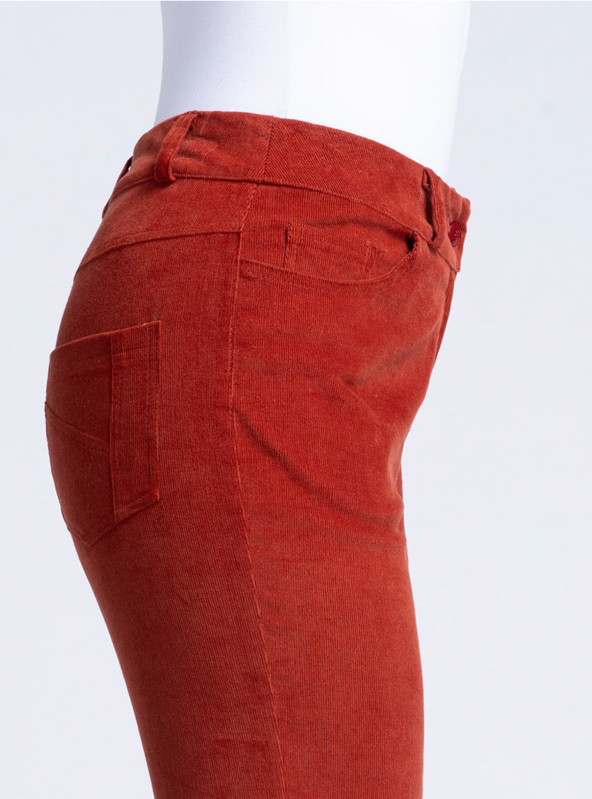Pantalon femme en velours rouge brique